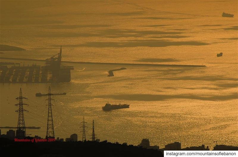 Port, containers terminal, high tension pylons and golden summer sea... (Port of Beirut)