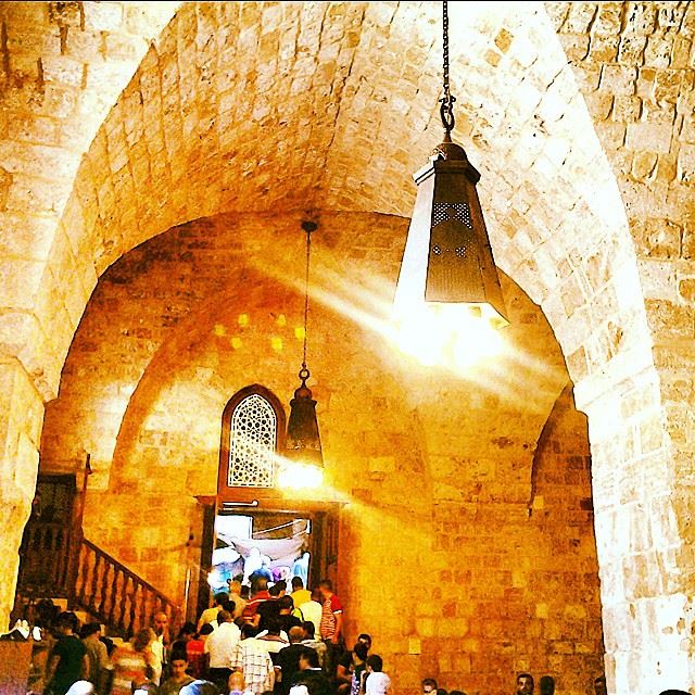 Praying in Al Mansouri mosque, the biggest & oldest mosque in Tripoli, has...