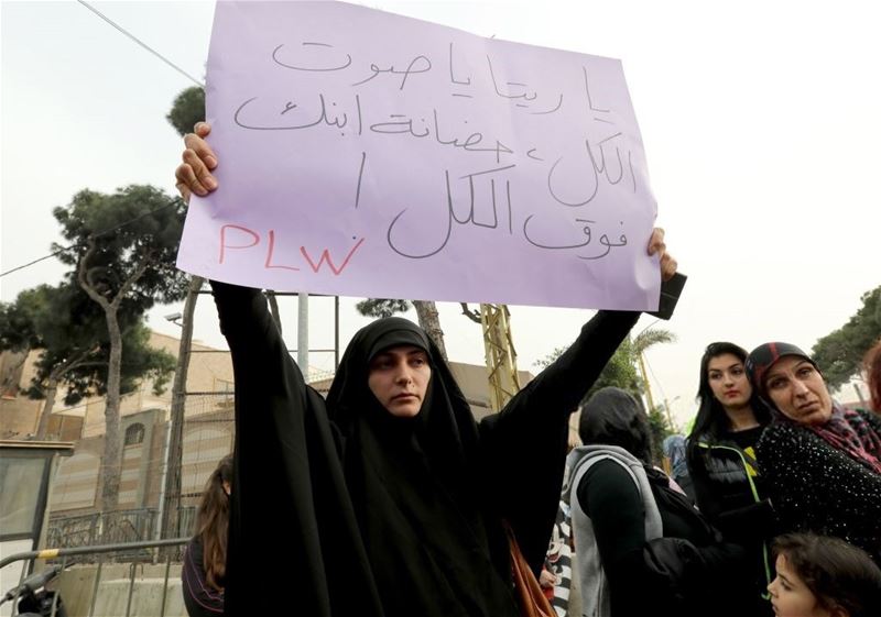 Protesters ask clerics to increase the age at which custody of children for divorced Shiite Muslim couples can be awarded to the mother, in front of Supreme Shiite Council, in Beirut. (Anwar Amro / AFP) via pow.photos