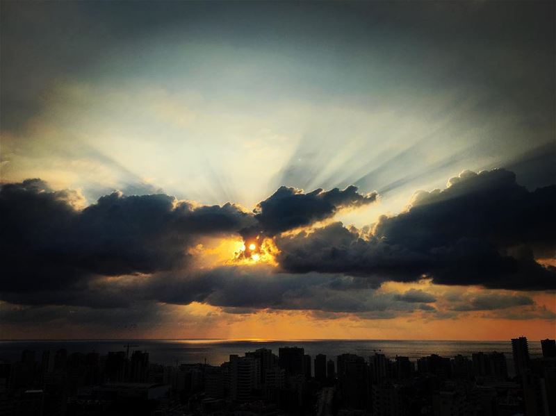 Rays of life penetrates cloud's darkness and prove that no matter what... (Beirut, Lebanon)