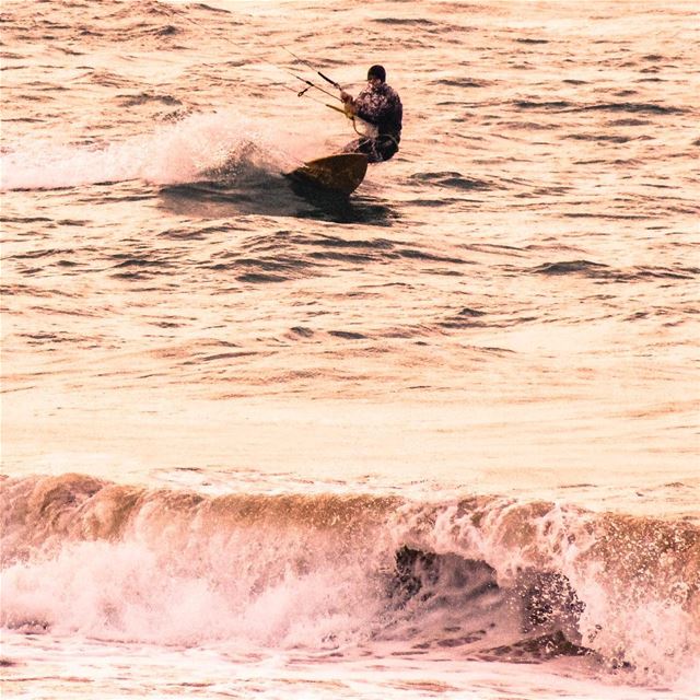 Riding the waves on a very cold day! The adrenaline steals the cold away... (Laguava Resort Rmeileh)