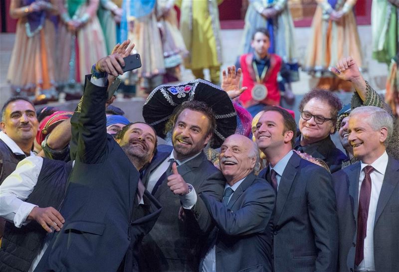 Saad Hariri snapping a selfie with official representatives in addition to singer Assi Hellani and poet Talal Haydar, during the opening of Caracalla’s “Sailing the Silk Road”. (Nabil Ismail)