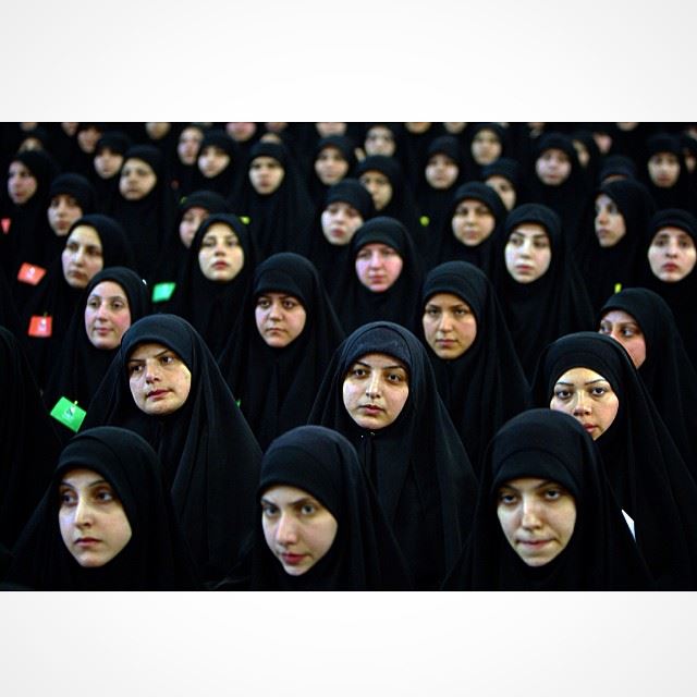 Shiite women listen to the speech of Hezbollah leader Hassan Nasrallah...