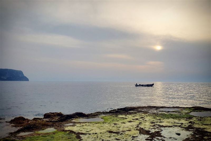  sunset rocky beach boat clouds horizon mountainfellas summer vibes... (Chekka)