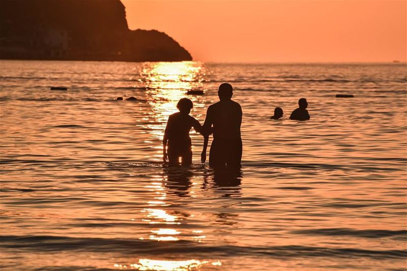 Taking his 85 years old mother to a sunset swim ...❤❤❤ lebanon  chekka ... (Florida Beach)