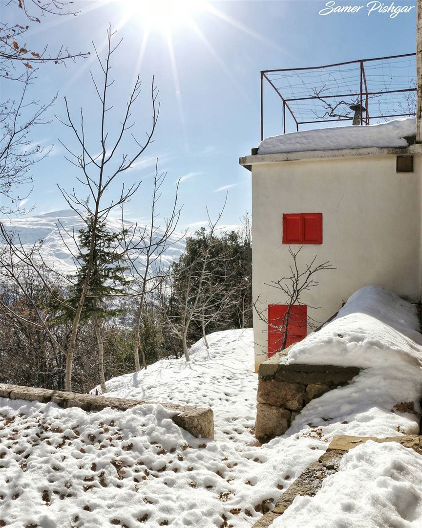 the house below Mount Sannine.. covered with snow under the sun.From...