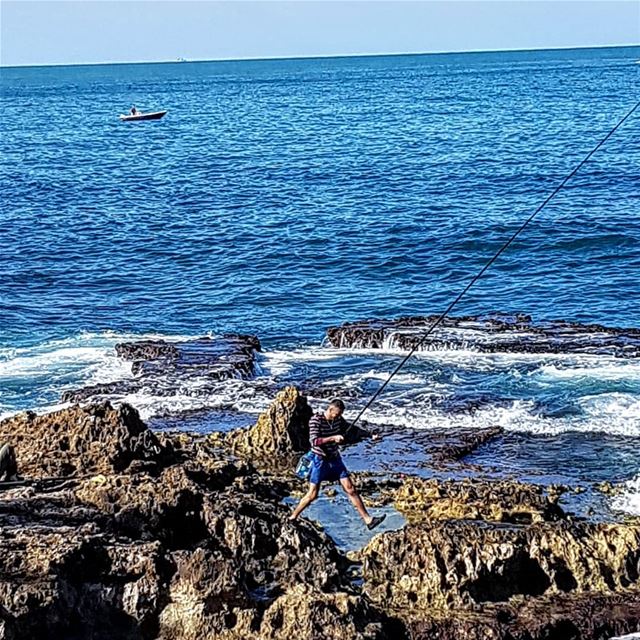 The Jumping Fisherman.  Beirut.. fishing  sun  sea  snow  lebanon ... (Beirut, Lebanon)