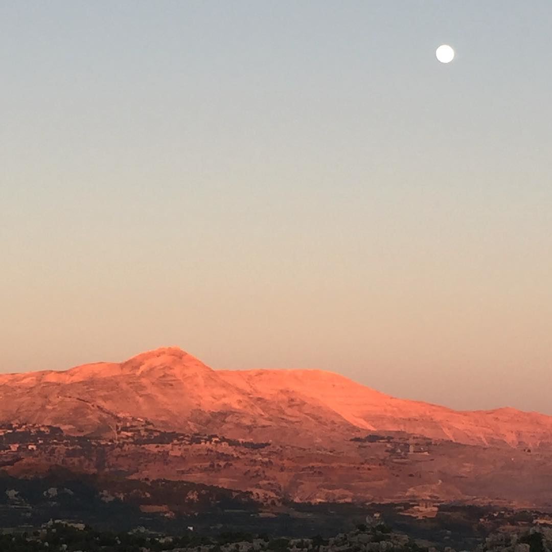 The  moon and the red  sunset over my beloved  mountains  landscape ...