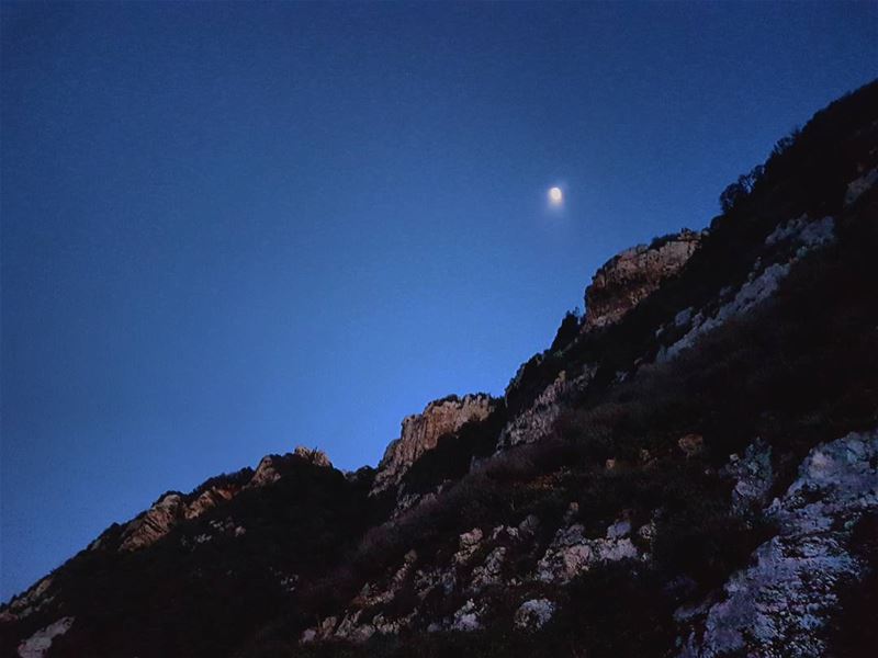 The moon shook and curled up like gentle fire.  love  moon  mountains ...