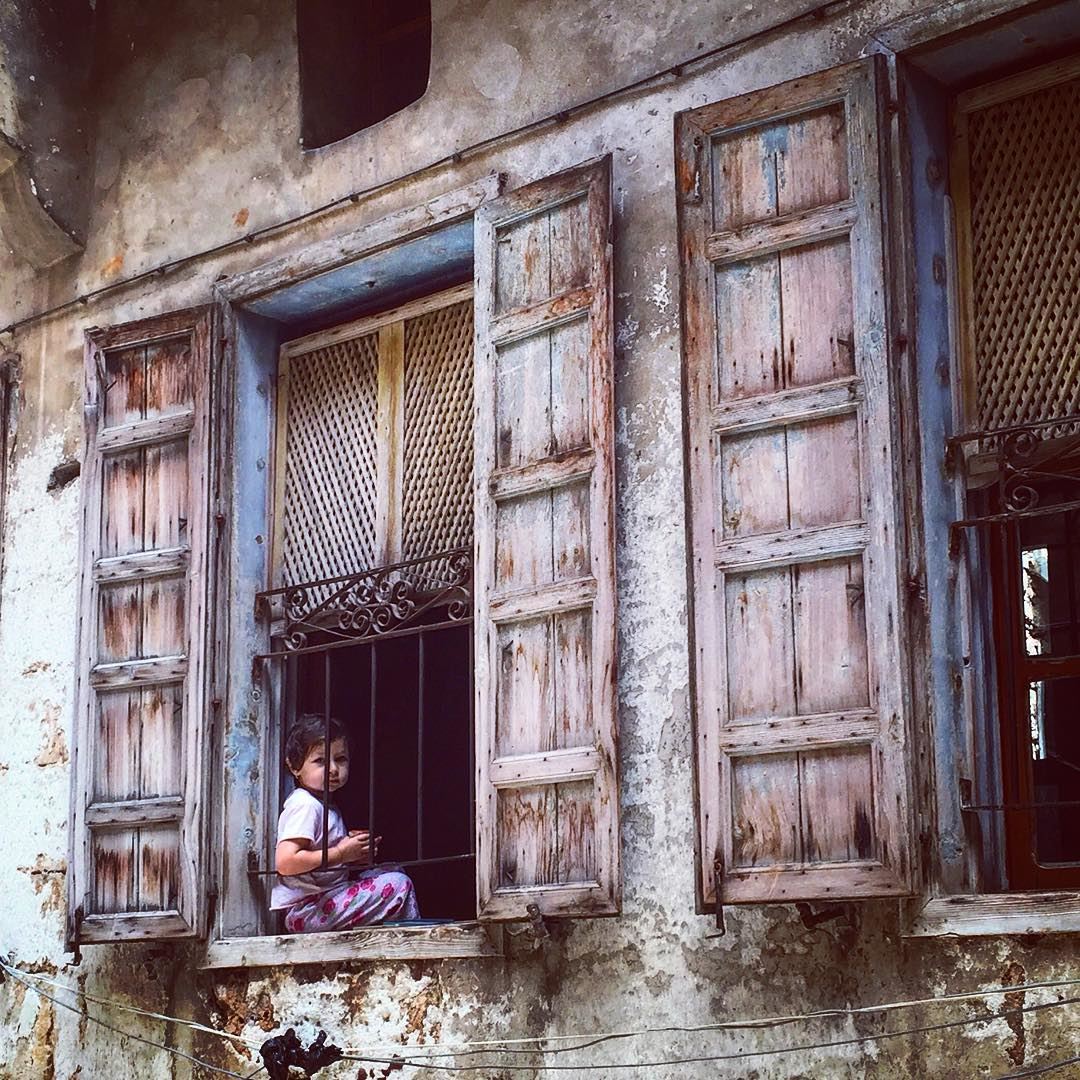 The old is home to raised memories and opened windows to external world.... (Tripoli - The Old City)
