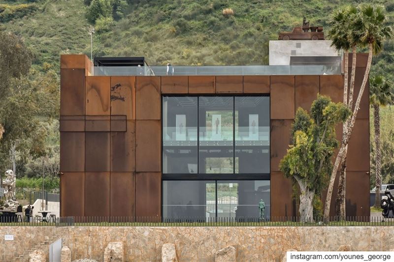 The rear side of the rust colored Nabu Museum in Chekka, North Lebanon...