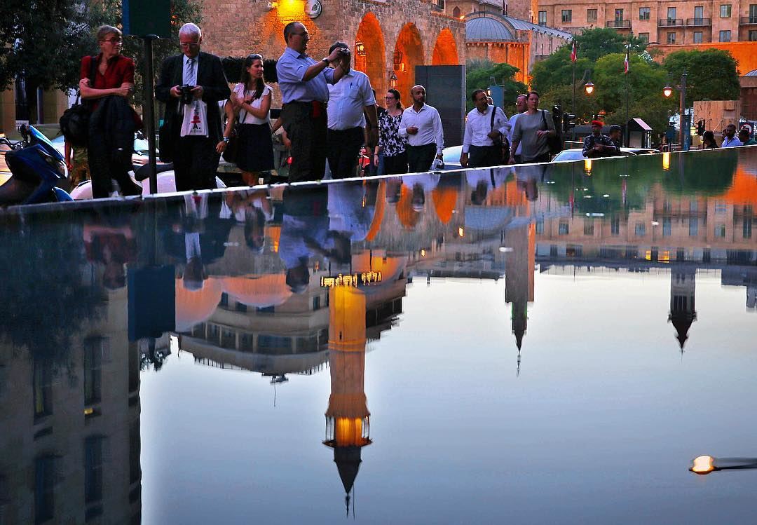 The reflection of prince Mansour Assaf mosque is seen in the water of...