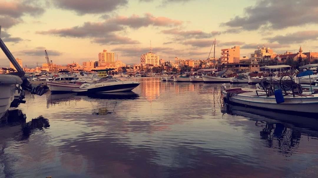 The sky broke like an egg into sunset and water caught fire 🌅. ~Pamela... (Tyre, Lebanon)