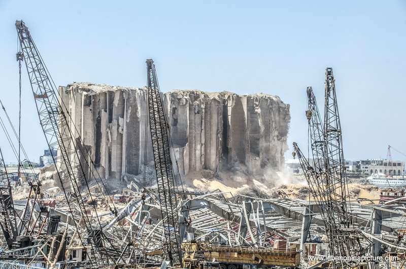 The still standing wheat storage and the explosion area in Beirut Port