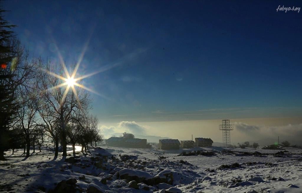 The sun breaking through the fog and  mist over the montain... (Qanat Bakish, Mont-Liban, Lebanon)