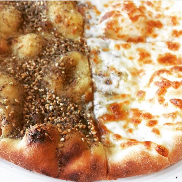 The warm smell of a Zaatar & Cheese Manouche waiting for you in @woodenbakery.leb  (Wooden Bakery (zalka))