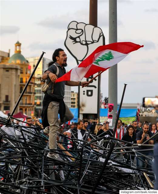 They broke the tents, put the sign on fire, smashed everything on their... (Martyrs' Square, Beirut)