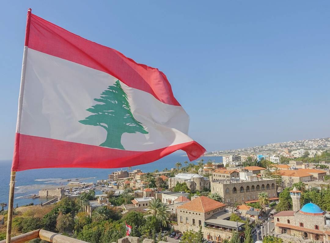 This Lebanese flag waves from the crusader citadel, that overlooks the the... (Byblos, Lebanon)