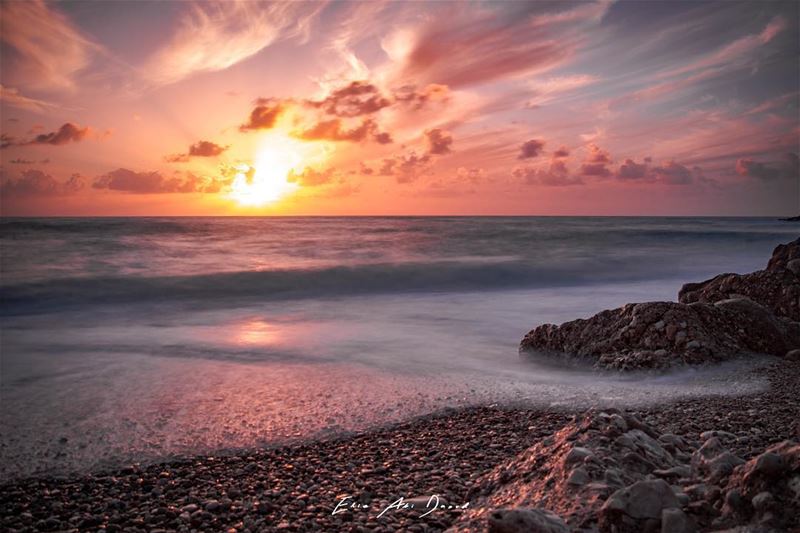 Those mesmerizing sunsets are back 🌅   sunset  beach  colors  rocks ...