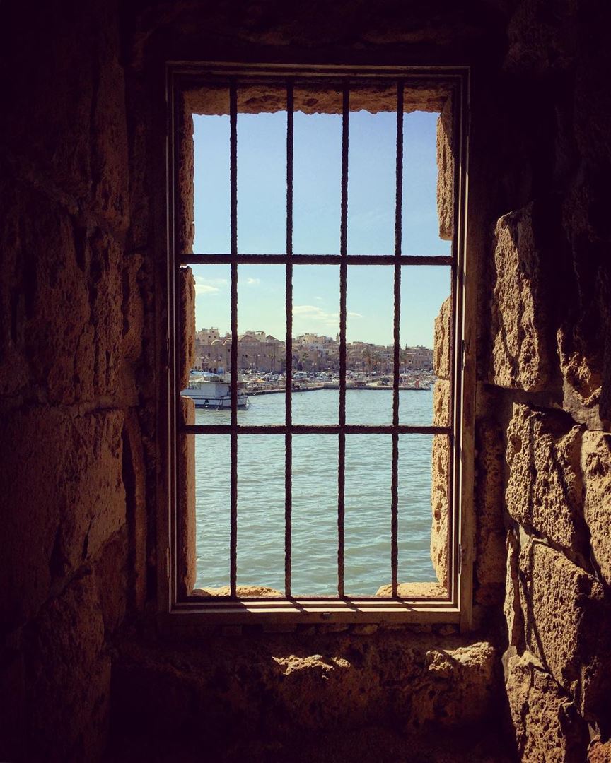 Trapped•••••••••••••••••• ruins  bars  window  sea  port  boats  fish ... (Sidon Sea Castle)