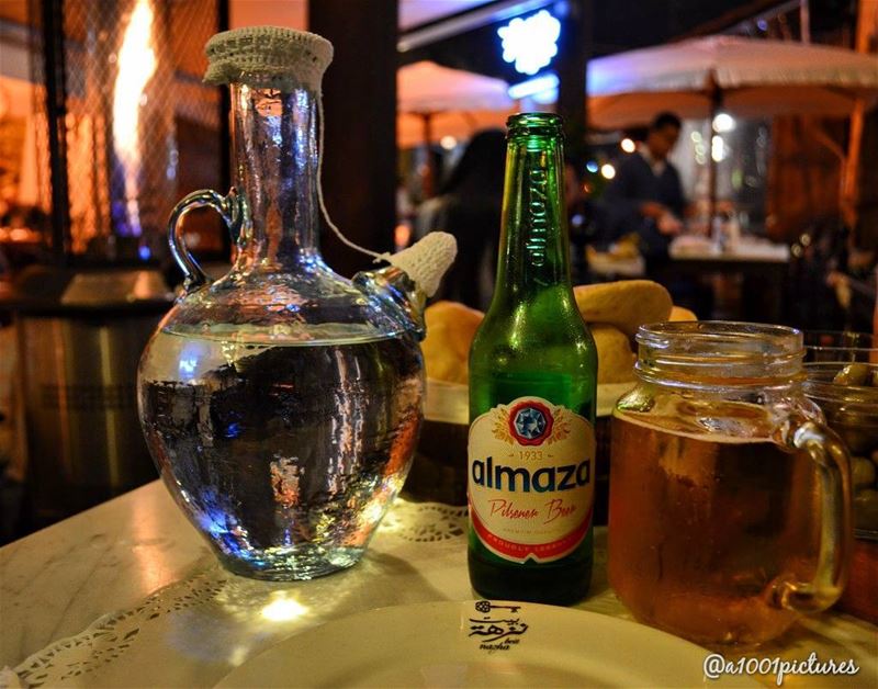 Two iconic Lebanese items:The traditional drinking water jug and Almaza... (Byblos, Lebanon)
