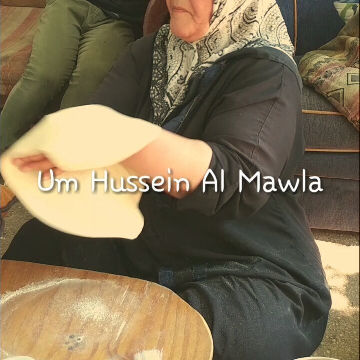 Um Hussein Al Mawla from Laboueh (Bekaa) making manaeesh from scratch on a... (Bekaa)