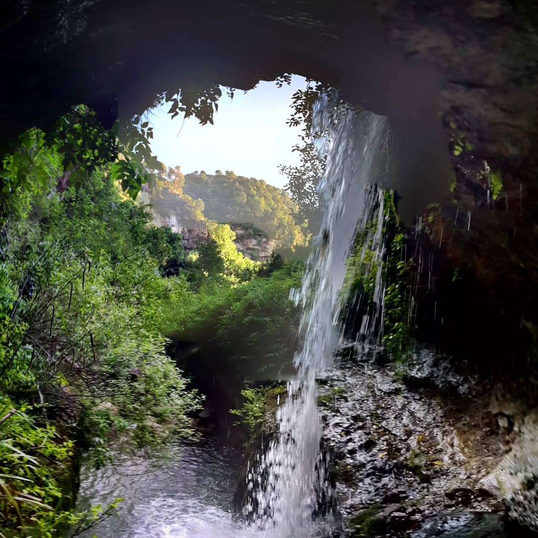 Under the waterfall :What you seem as a tight waterfall is actually an...