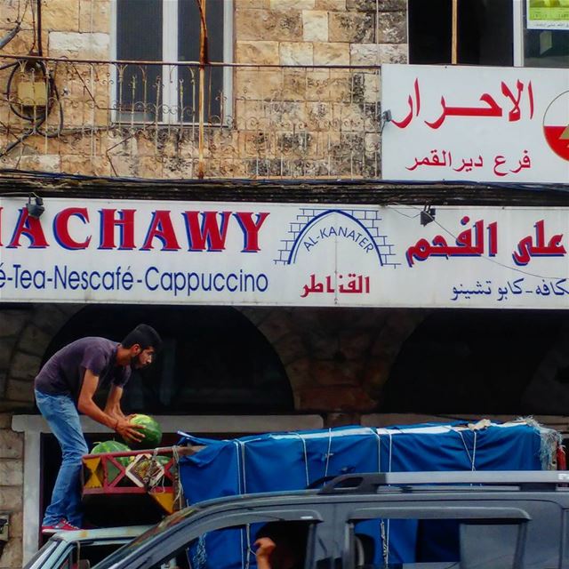 Unloading watermelons, one at a time.  supplychain  watermelon ... (Dayr Al Qamar, Mont-Liban, Lebanon)