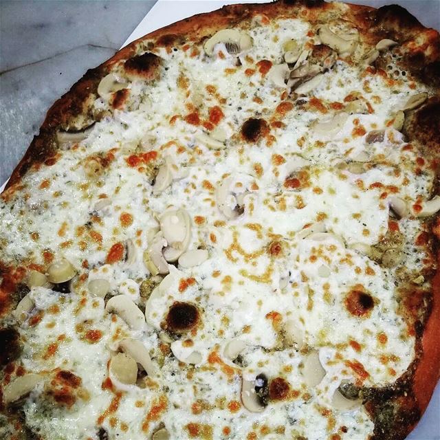 What is better than a crispy taste of zaatar mashrouha topped with cheese... (Rashet somsom - رشة سمسم)