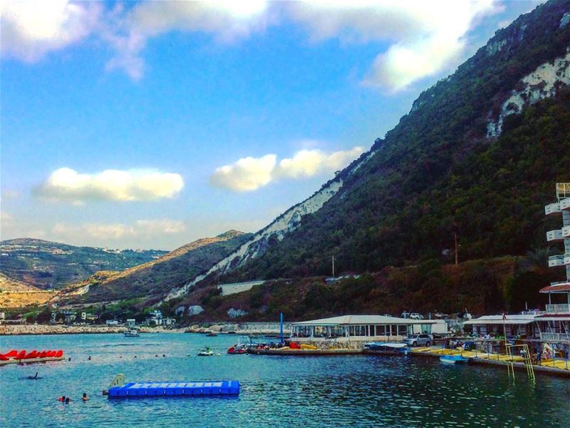 Where the mountains meet the sea 🌊 beach  sea  outdoor  floaters ... (Chekka)