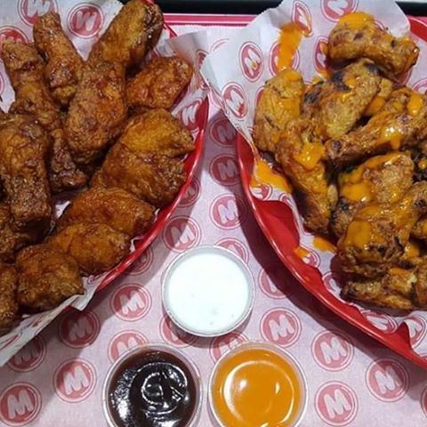 Whether  your a man or woman, everyone's got a taste for hot wings !!!! (Megabite Broasted & Grill)