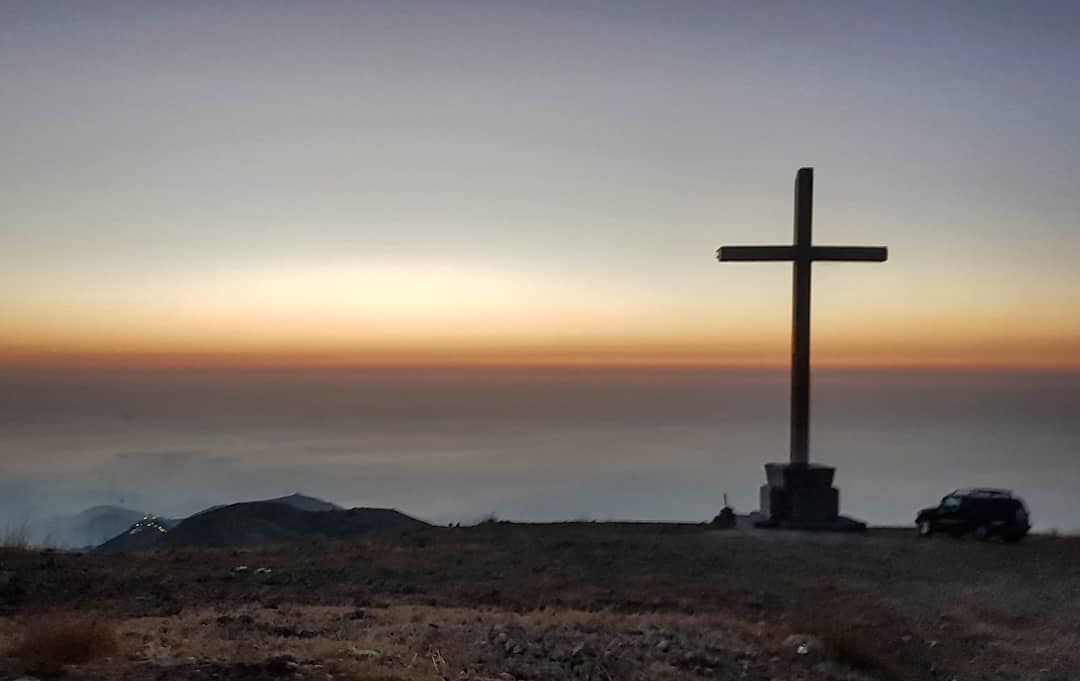 "While the world changes, the cross stands firm".  sunset  mountains ... (Ehden, Lebanon)