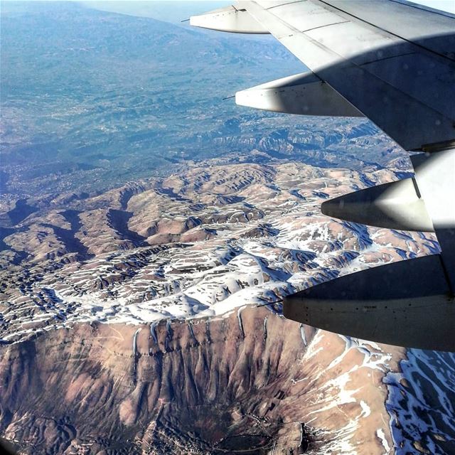 Window seats are my favorite . Final snow spots seen from above ✈️...