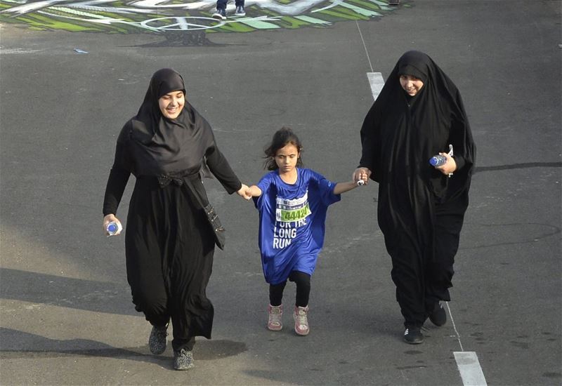 Women taking part in the seven kilometers Fun Run during the annual Beirut International Marathon.