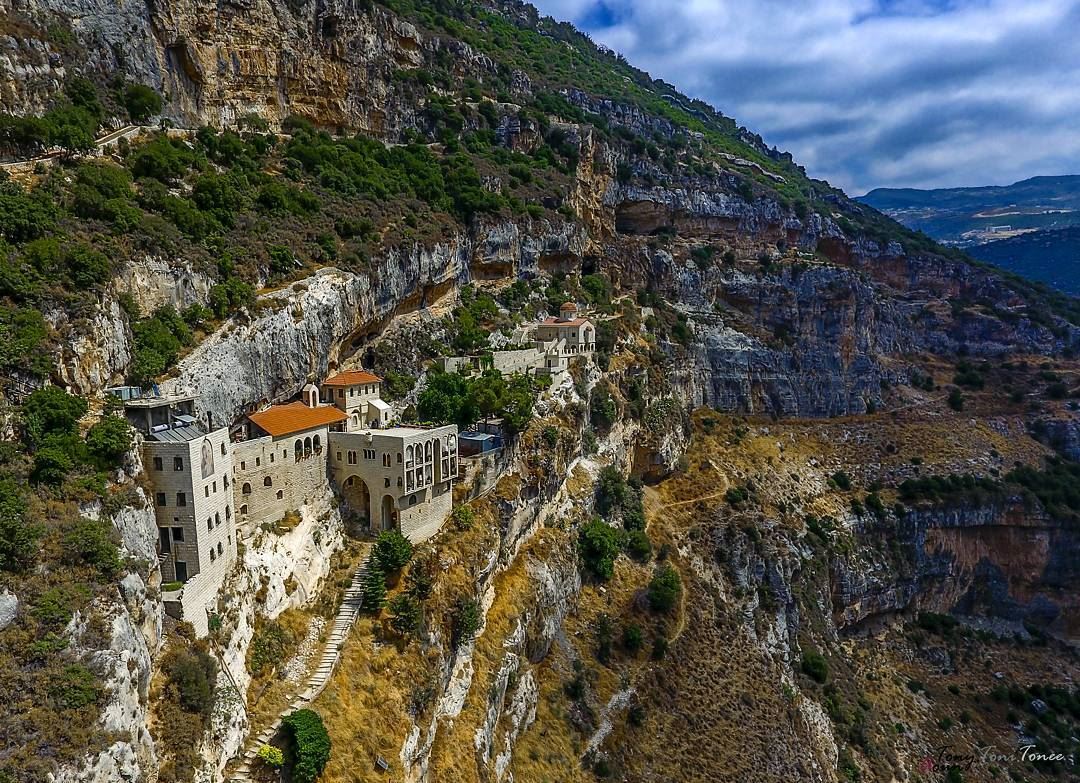 You see those paths and rooms built inside the rocks on that high mountain, (Koûsba, Liban-Nord, Lebanon)